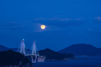 Scenic view of sea against sky at night