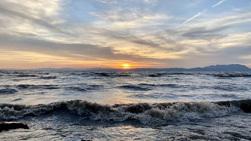 Scenic view of sea against sky during sunset