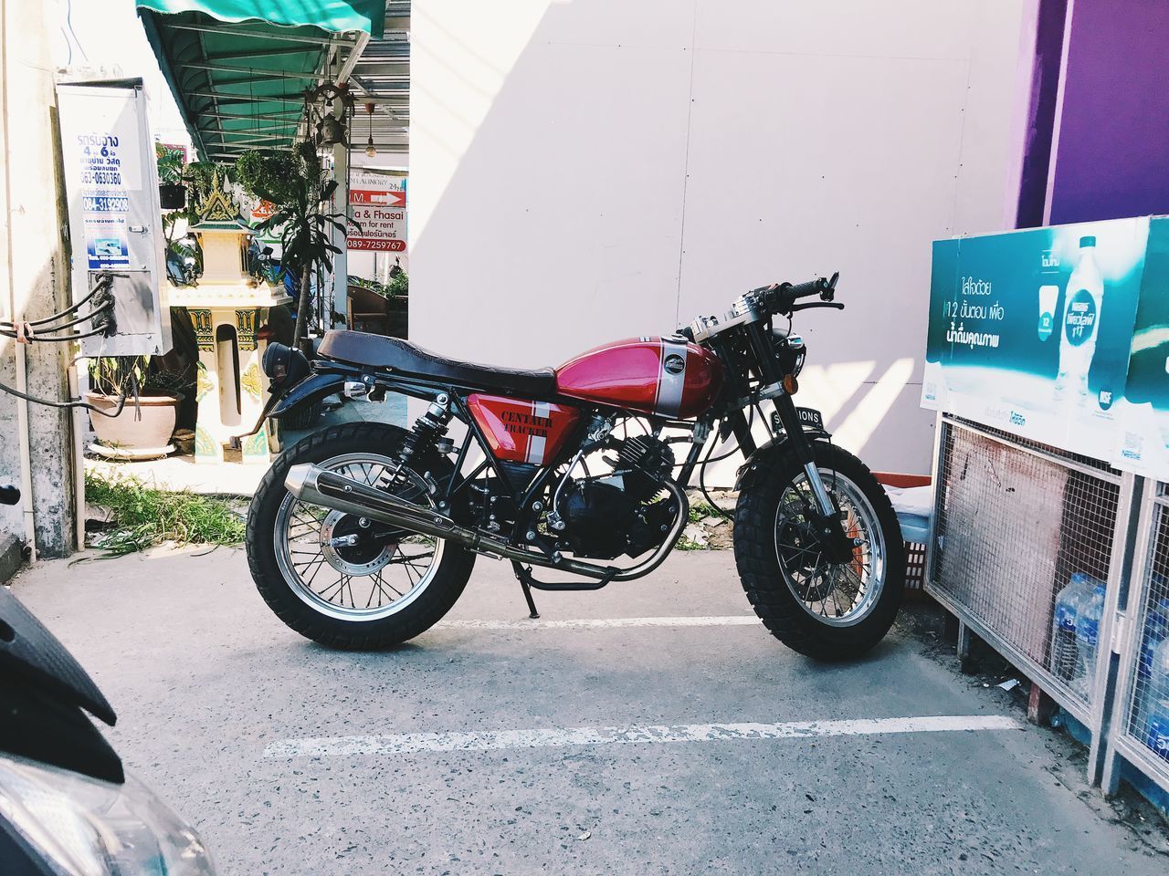 BICYCLE PARKED ON ROAD