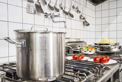 Close-up of container on stove in kitchen