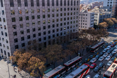 High angle view of traffic on road by buildings