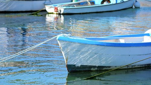 Boat moored in lake