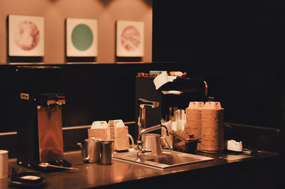 Close-up of wine bottles on table in restaurant