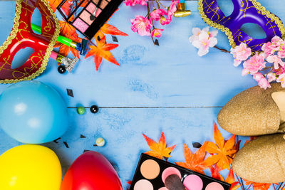 High angle view of multi colored umbrellas on table