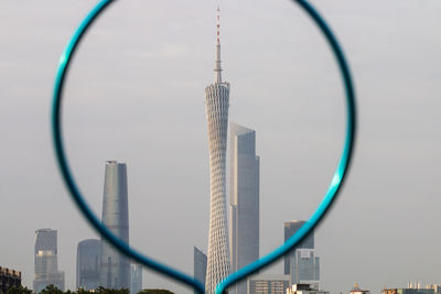 Low angle view of cityscape against sky