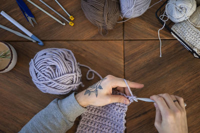 High angle view of woman working on table