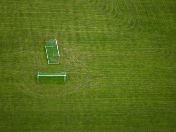 Aerial shot of football goals on an empty field