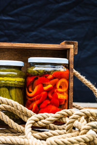 Midsection of person holding rope