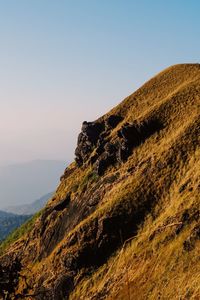 Scenic view of rocky mountains against clear sky