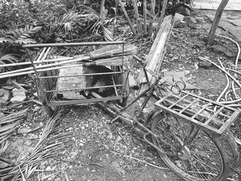 High angle view of abandoned motorcycle on field