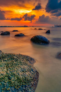 Scenic view of sea against sky during sunset