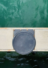 High angle view of swimming pool by lake