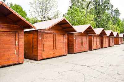 Built structure on field against buildings