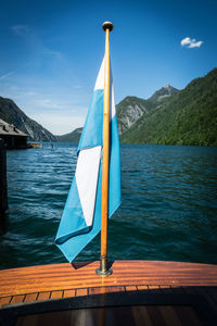 Scenic view of lake against blue sky