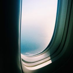 Cropped image of airplane window