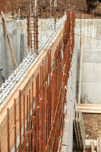 Construction of a new building, installation of metal structures in the base of the wall