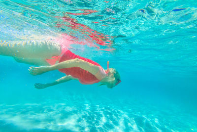 Man swimming in sea