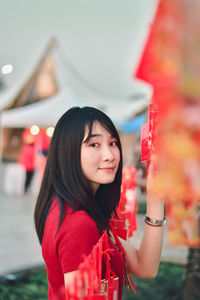 Portrait of young woman smiling