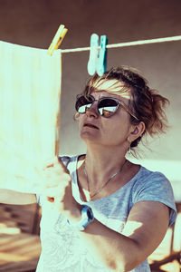 Portrait of young man wearing sunglasses