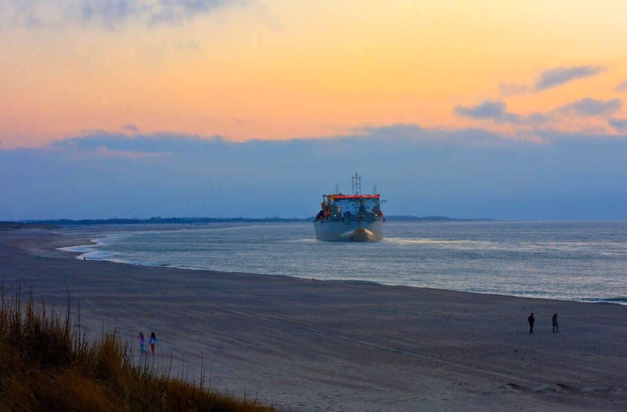 sea, beach, sunset, nautical vessel, nature, sky, water, beauty in nature, horizon over water, cloud - sky, transportation, sand, scenics, real people, outdoors, wave, day