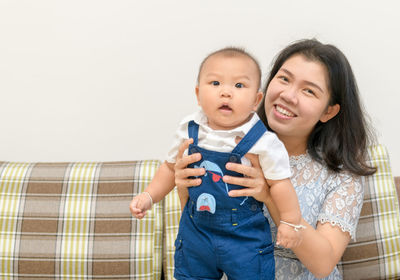 Portrait of happy mother and daughter