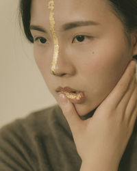 Close-up portrait of young woman