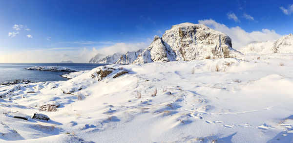 Scenic view of sea against sky during winter