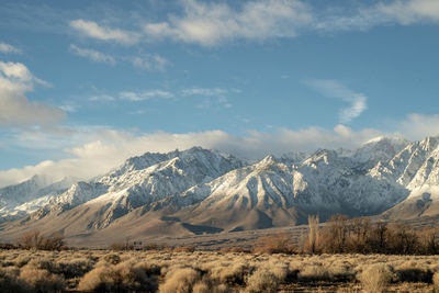 Scenic view of snowcapped mountains against sky