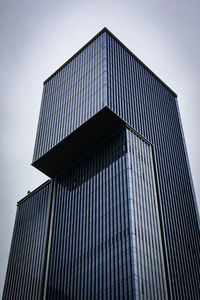 Low angle view of modern building against clear sky