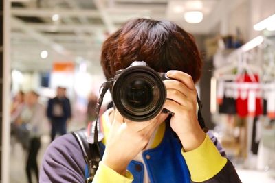 Photographer taking picture with digital camera