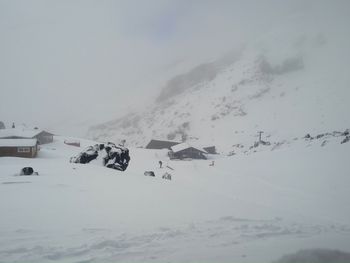 Scenic view of snow covered mountain against sky