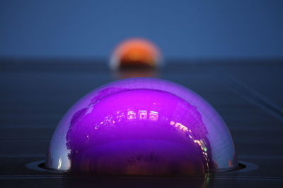 Close-up of light bulb against blurred background