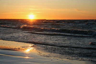 Scenic view of sea against sky during sunset