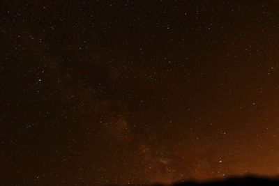 Low angle view of stars in sky at night