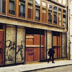 Woman walking on city street