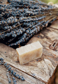 Making handmade natural soaps on an old wooden table