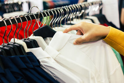 Row of shirts on hangers