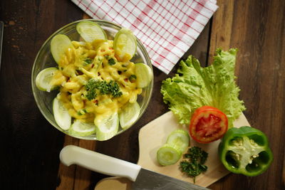 High angle view of fruits on cutting board