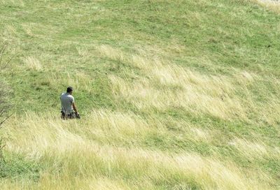 Rear view of man on field