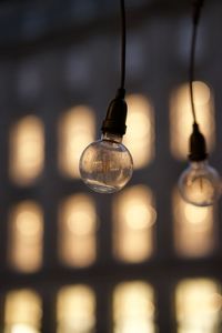 Low angle view of illuminated light bulb