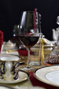 Close-up of wine in glass on table