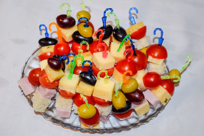 High angle view of multi colored candies in plate