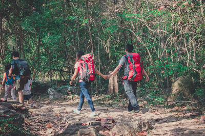 People walking in forest