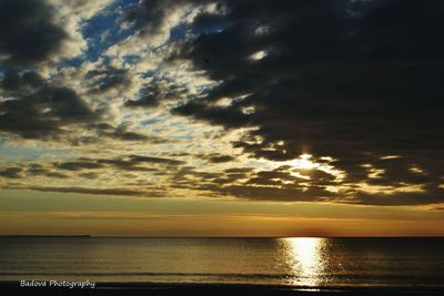 Scenic view of sea against dramatic sky