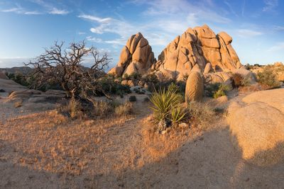 Rock formations in desert against sky