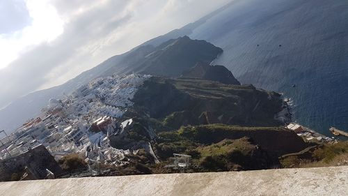 Aerial view of landscape and mountains against sky