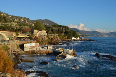 View of town against blue sky