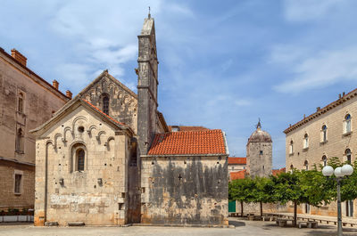 Exterior of buildings against sky in city