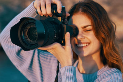 Portrait of man photographing