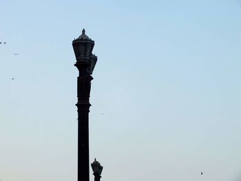 Street light against clear sky